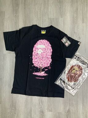 A Bathing Ape Black Tee with Pink Cherry Blossom Ape Logo